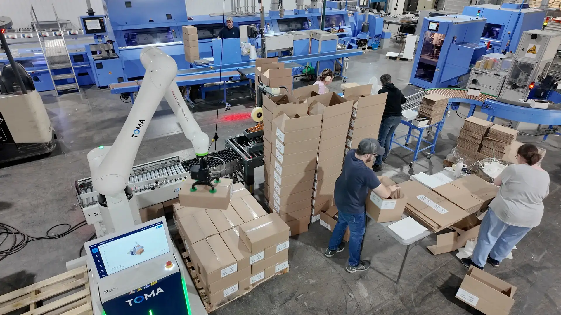 TOMA palletizer in operation at Multi Excel's facility